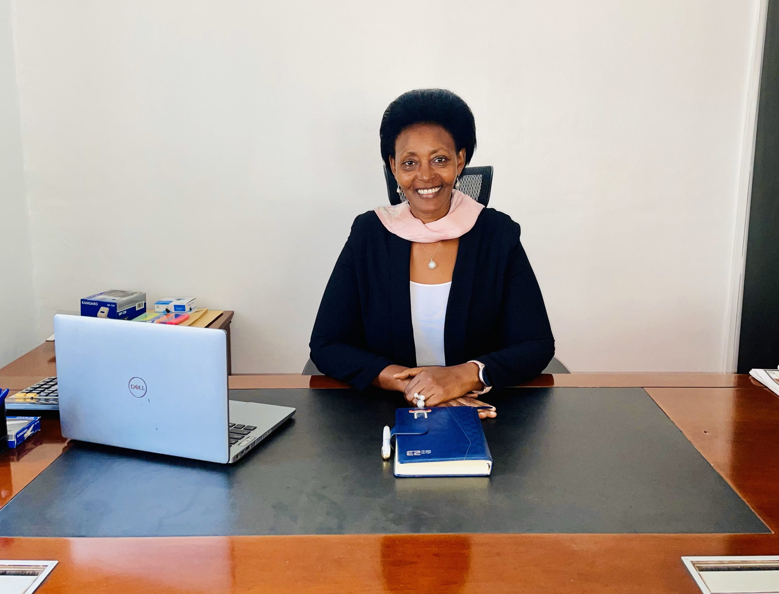 New UWESO CEO, Mrs. Jolly Kamugira Kaguhangire, in her office